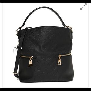 Louis Vuitton
Melie Handbag Monogram Empreinte Leather